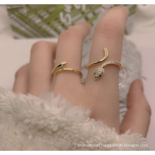 Shangjie Oem Arette Großhandel Danity Finger Ring Mode Verstellbares vergoldetes Schmuck Vintage Zirkon Schaltschlange Ring